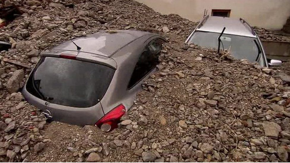 Cars buried after flooding in southwest Germany