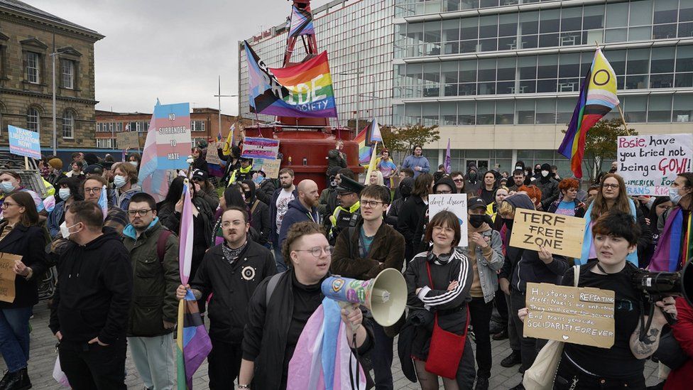 Trans rights protestors counter-protest a Let Women Speak rally in Belfast