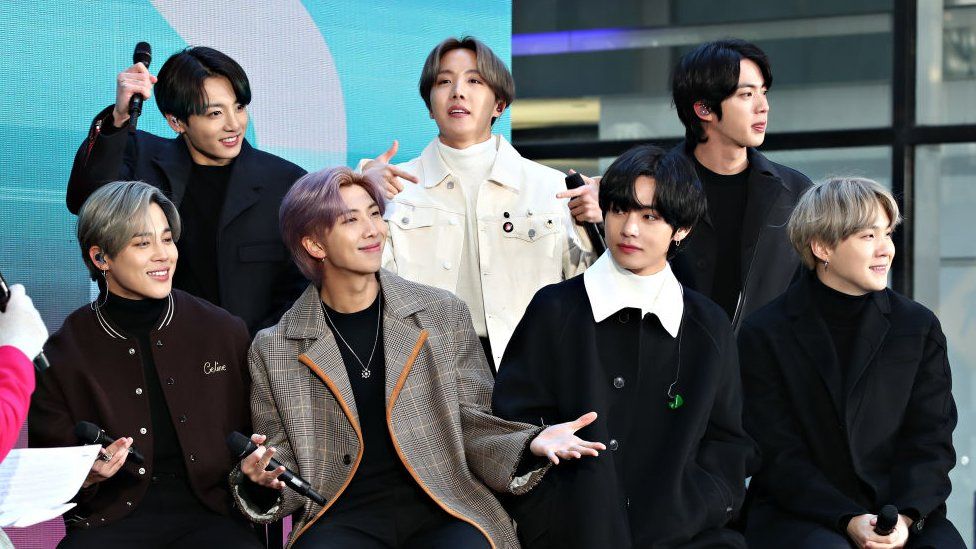 (L-R) Jimin, Jungkook, RM, J-Hope, V, Jin, and SUGA of the K-pop boy band BTS visit the "Today" Show at Rockefeller Plaza on February 21, 2020 in New York City.