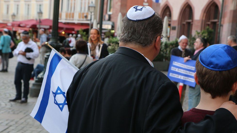 People wear the kippah at the "Show Face and Kippah" in Frankfurt am Main, central Germany on 14 May 2018.