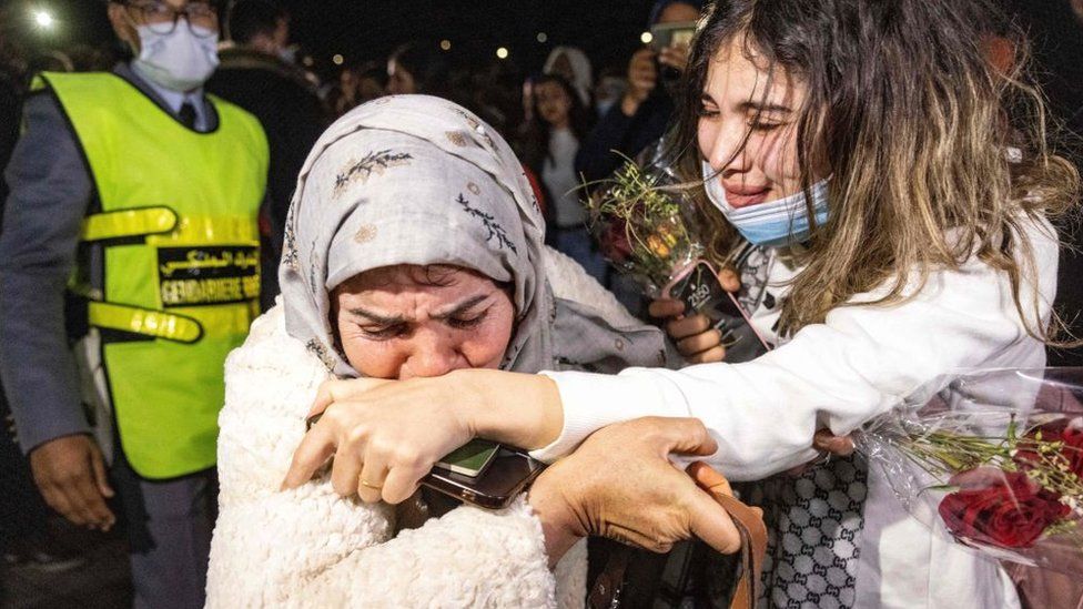 Moroccan students studying in Ukraine and fleeing the war react when they meet with their relatives after arriving to Mohammed V airport in Casablanca on March 2 , 2022