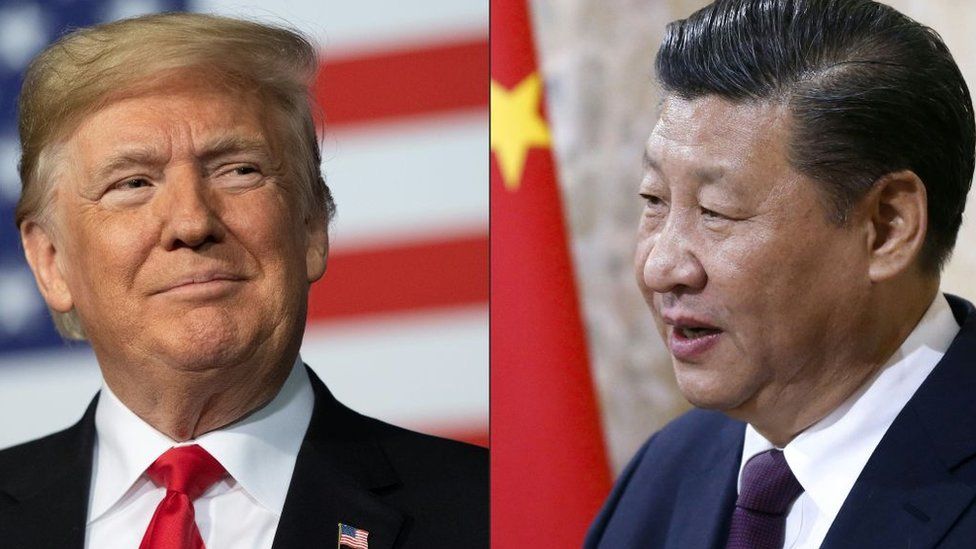 This combination of pictures created on May 14, 2020 shows recent portraits of China's President Xi Jinping (R) and US President Donald Trump.