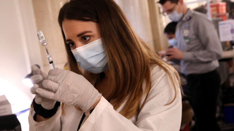 A pharmacist prepares doses of the Johnson & Johnson vaccine at a vaccination clinic in Boston, US on 4 March, 2021