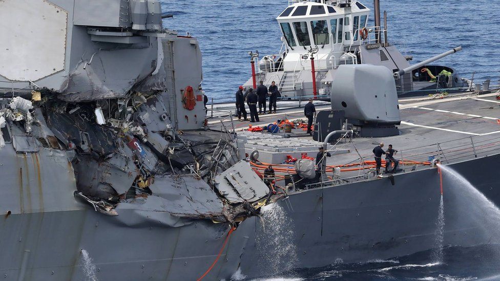 damages on the guided missile destroyer USS Fitzgerald off the Shimoda coast after it collided with a Philippine-flagged container ship on June 17, 2017.
