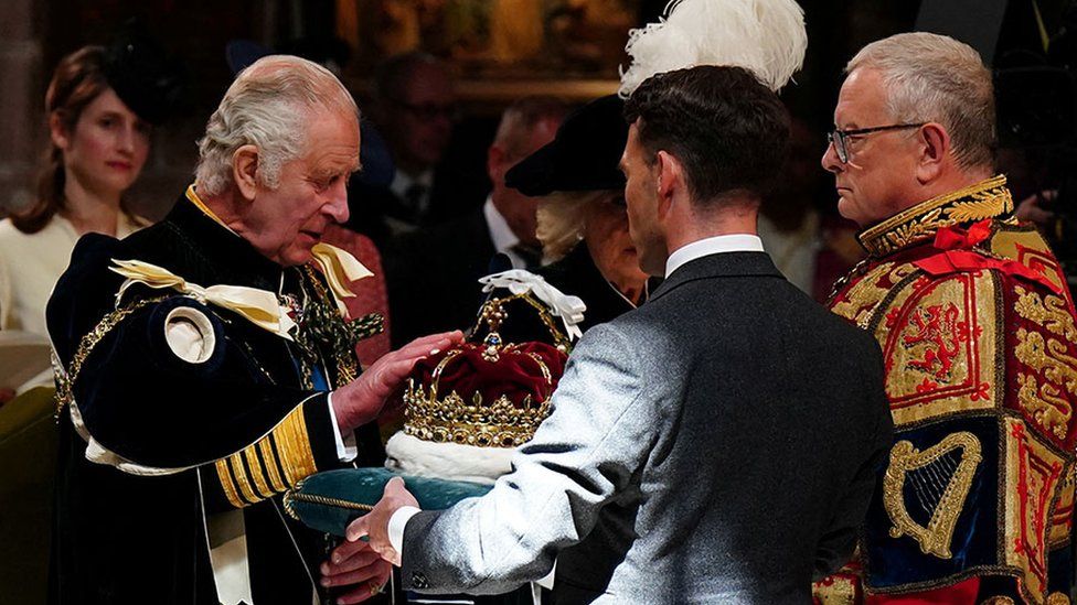 The King was presented with the crown by the Duke of Hamilton and Brandon