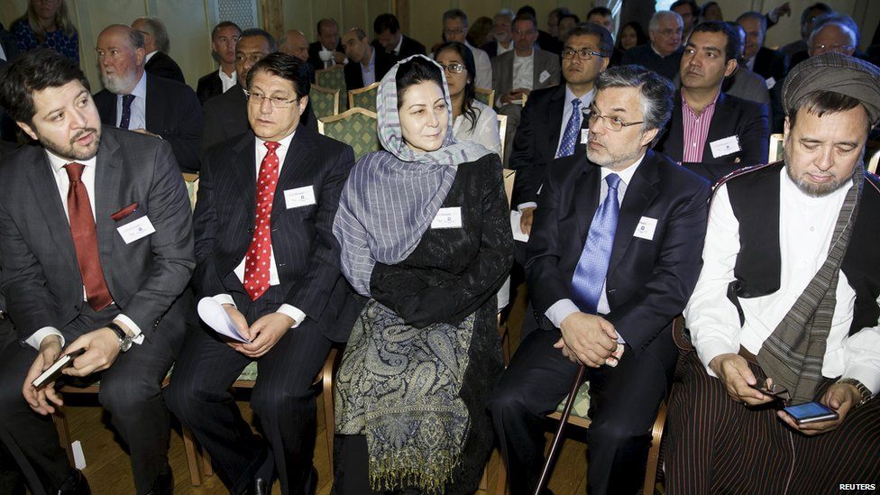 Afghan Deputy Foreign Minister Hekmat Khalil Karzai, Transportation and Commerce Minister Anwar ul-Haq Ahady, Women's Affairs Minister Husn Banu Ghazanfar, former vice president Yunus Qanuni, and MP Mohammad Mohaqiq attend the opening of the Oslo Forum 2015 on 16 June