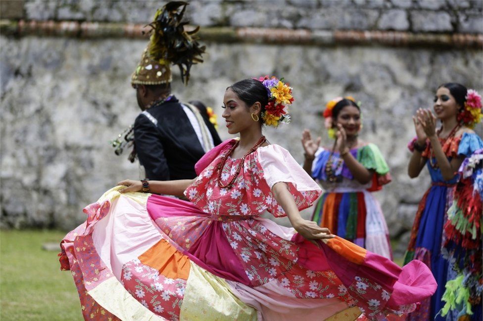 People participate in the 5th annual Festival of the Pollera Congo, in the coastal town of Portobelo, Panama.