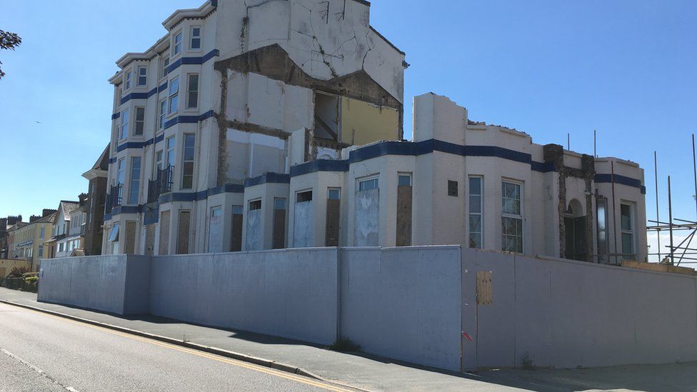 The part-demolished Cliff Hotel