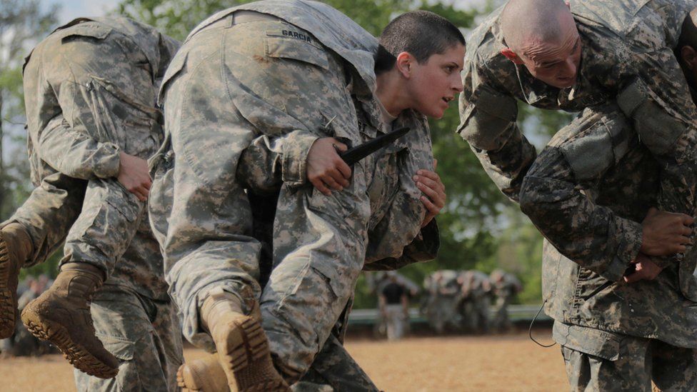 A female military officer takes part in a training exercise in the US