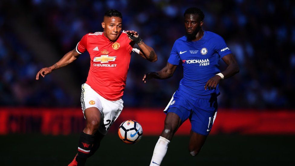 Antonio Valencia of Manchester United is challenged by Tiemoue Bakayoko of Chelsea during The Emirates FA Cup Final