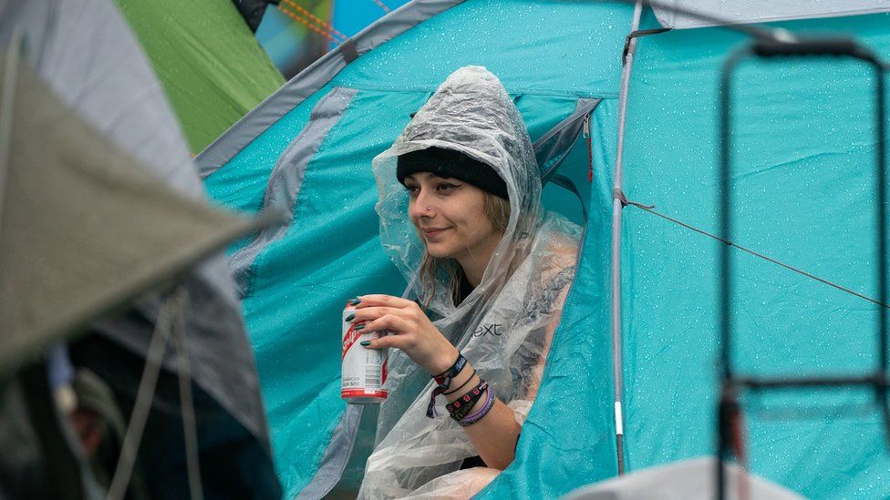 Woman in a tent at Download Festival 2021