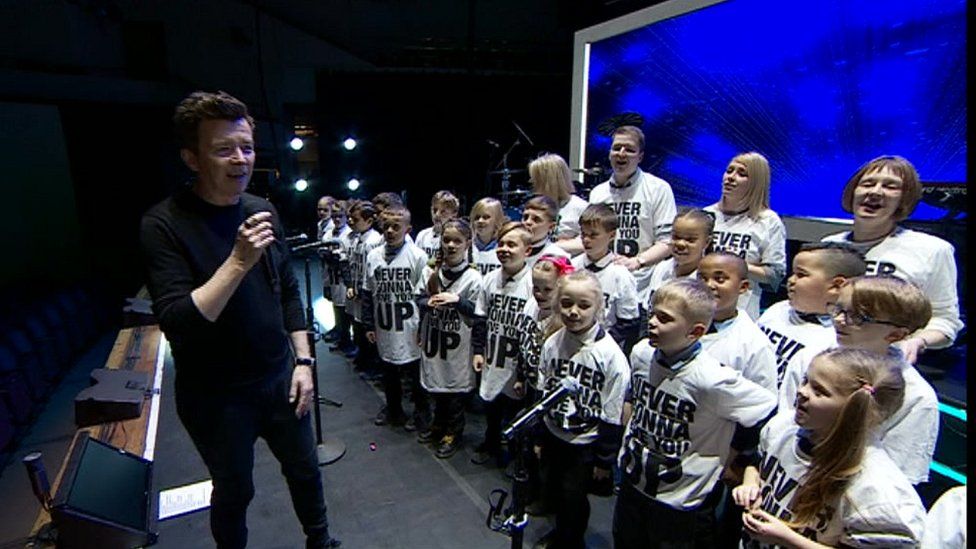 Rick Astley and pupils from Netherfield Primary School
