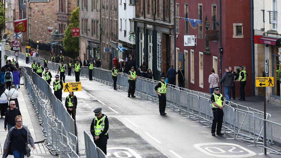 Police officers deployed along the Royal Mile in Edinburgh