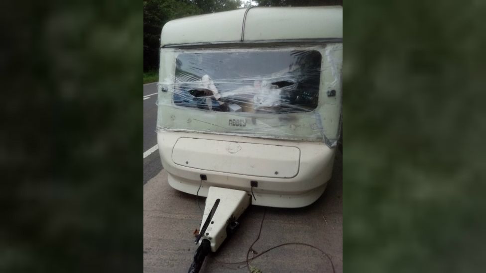 Cling filmwrapped junk caravan dumped in Leeds BBC News