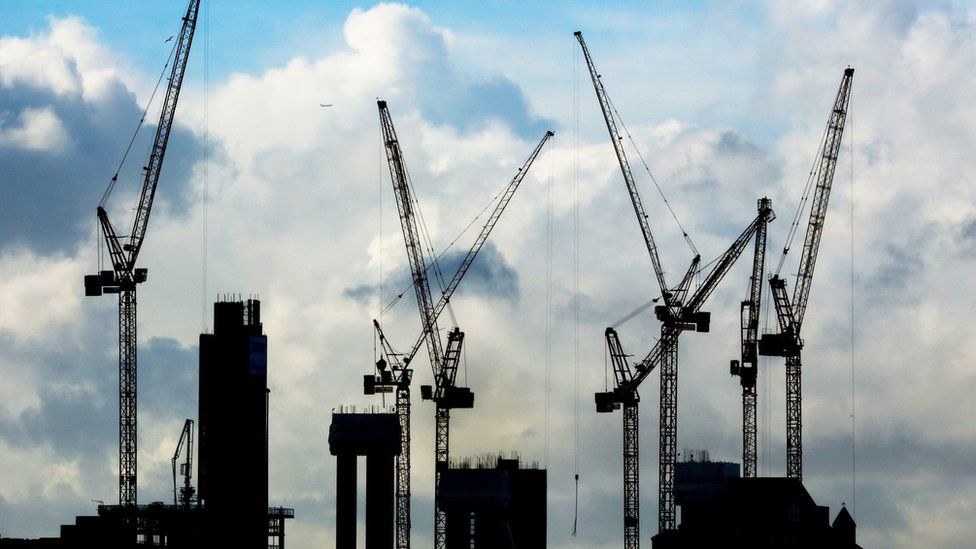 A general view of construction cranes on the London skyline.