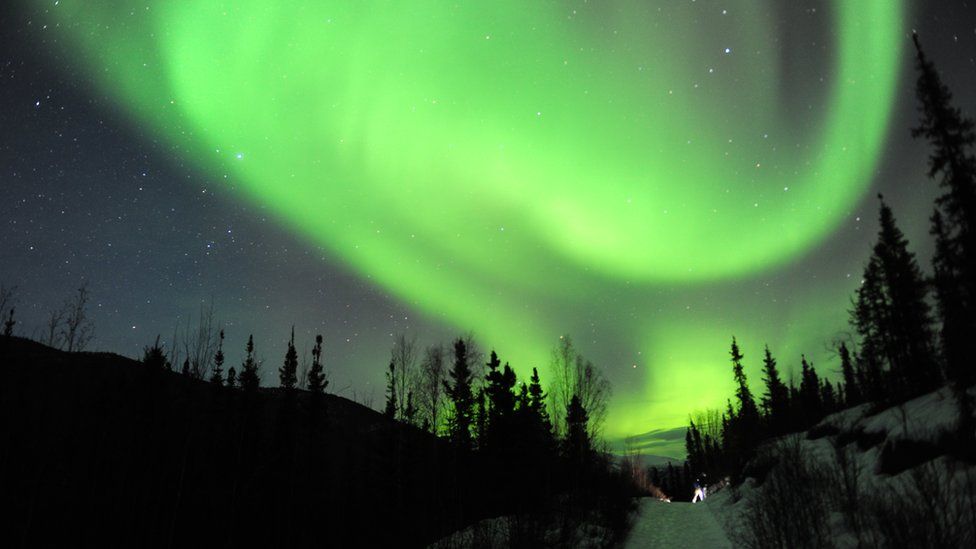Northern Lights appear in the sky over Alaska.