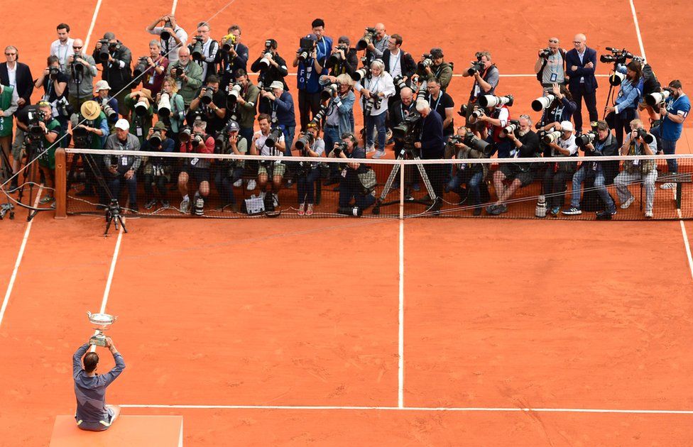 Rafael Nadal of Spain poses with his trophy