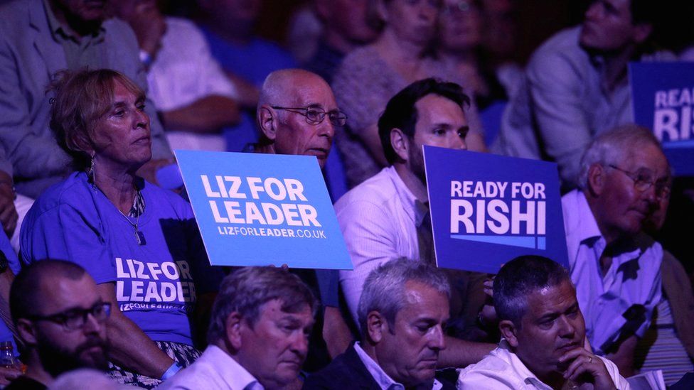 Supporters of Conservative leadership candidates Rishi Sunak and Liz Truss attend a hustings event, part of the Conservative party leadership campaign, in Exeter