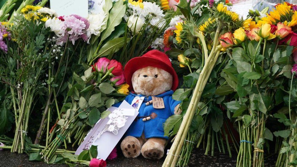 Paddington Bear tribute with flowers