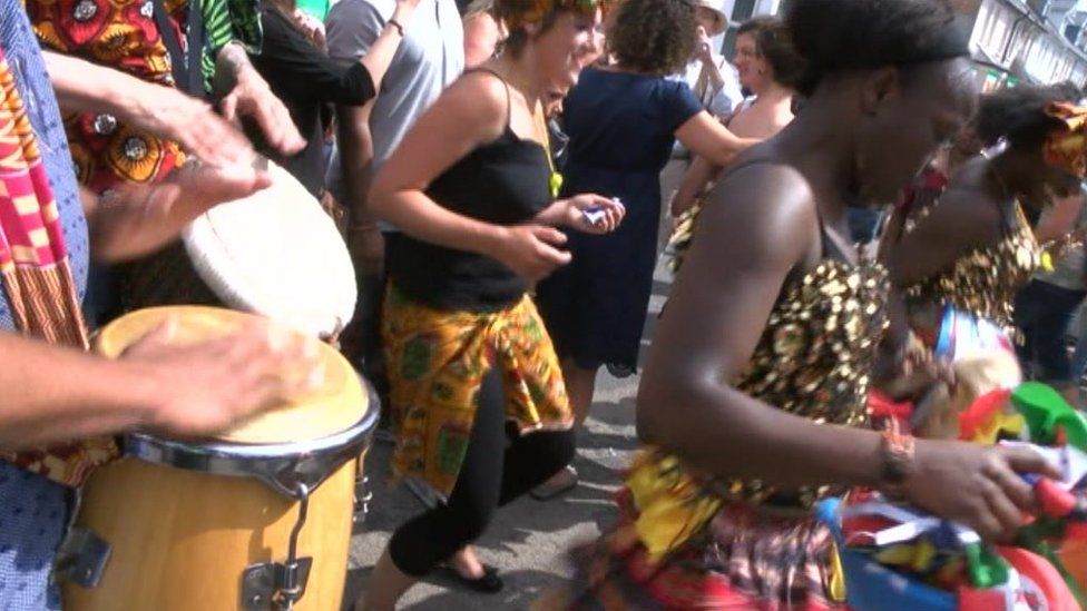 Women dancing at the Cowley Road Carnival