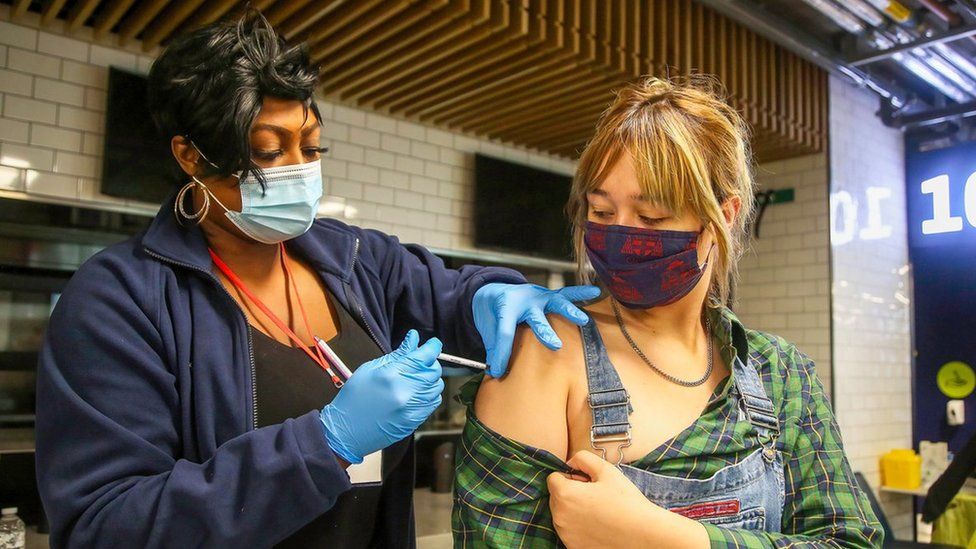 Young woman is vaccinated