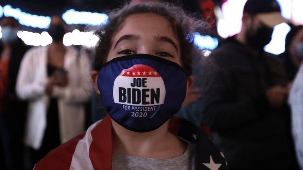 Biden supporter Elise, nine, in New York