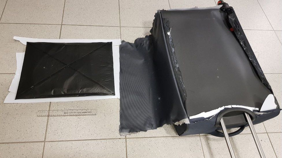 Suitcase with cocaine concealed