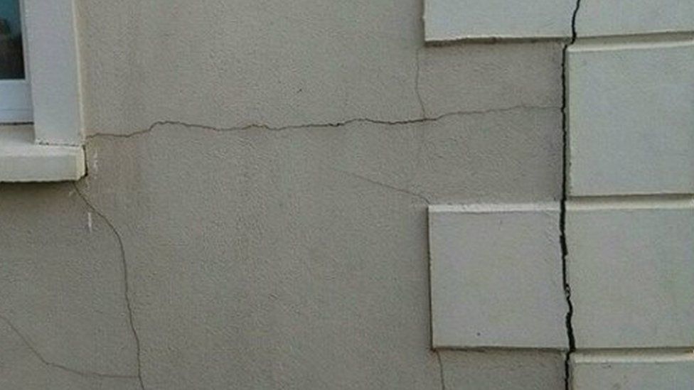 Cracks in the wall of a house