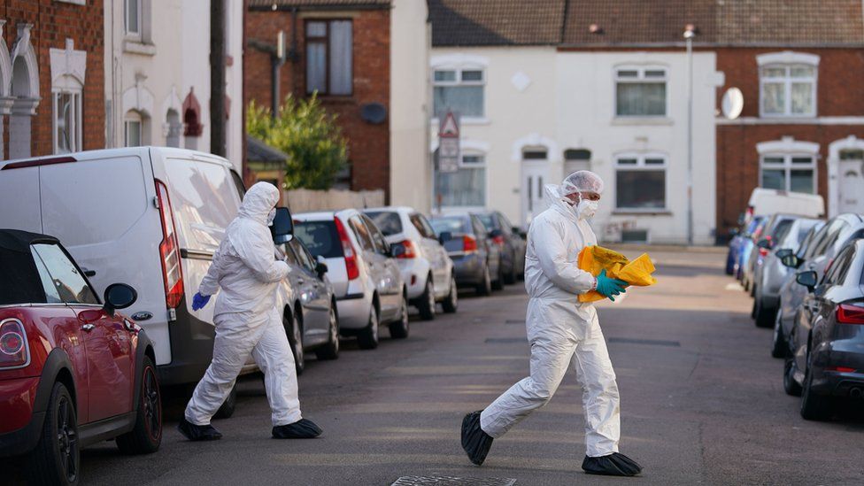 Forensic teams at a house in Northampton
