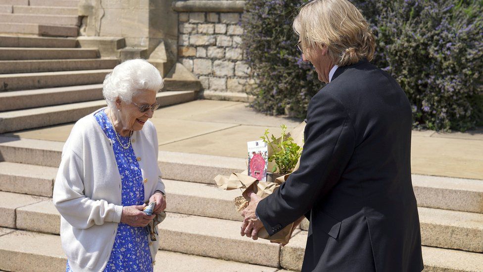 Queen Elizabeth II receives a Duke of Edinburgh rose, given to her by Keith Weed, President of the Royal Horticultural Society,, at Windsor Castle, Berkshire.