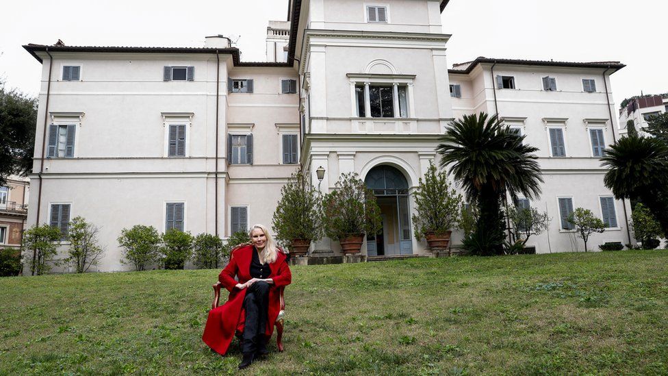 Princess Rita Boncompagni Ludovisi poses for a photograph outside Villa Aurora, a building that boasts Caravaggio's only ceiling mural