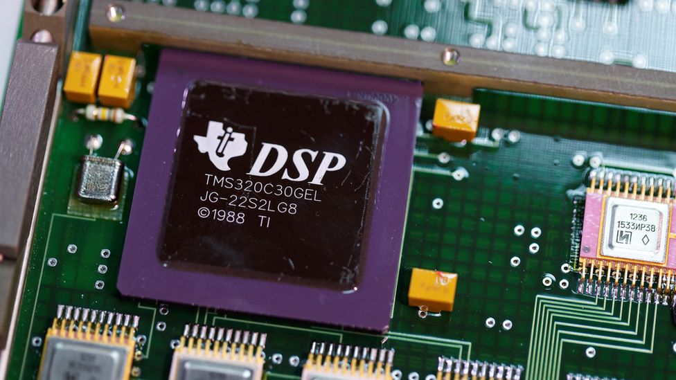 A Texas Instruments chip dated 1988 is seen on a circuit board found inside a Russian 9M727 missile