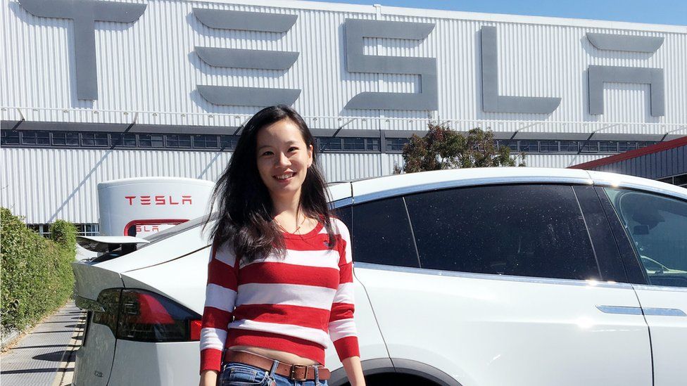 Han Zhu at the Tesla dealership