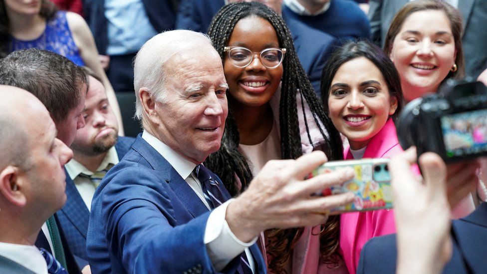 Biden taking selfie with