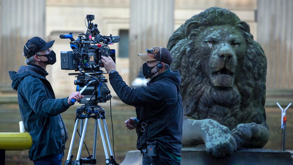 Camera operators outside St George's Hall in Liverpool