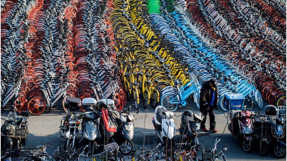 Racks of shared bikes piled up in China