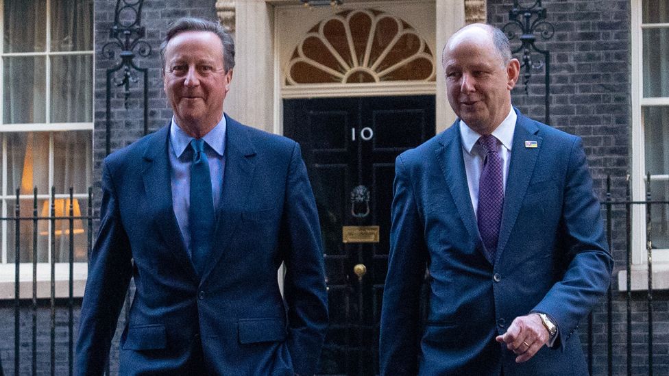 Britain's former Prime Minister, David Cameron leaves 10, Downing Street with Sir Philip Barton, the Permanent Under-Secretary of the Foreign, Commonwealth and Development Office, after being appointed Foreign Secretary in a Cabinet reshuffle on 13 November 2023 in London, England