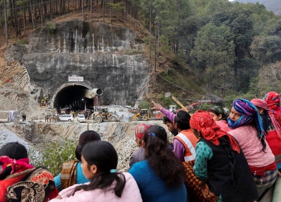 People wait outside a tunnel where rescue operations are underway to rescue trapped workers, after the tunnel collapsed, in Uttarkashi in the northern state of Uttarakhand, India, November 28, 2023. REUTERS/Francis Mascarenhas