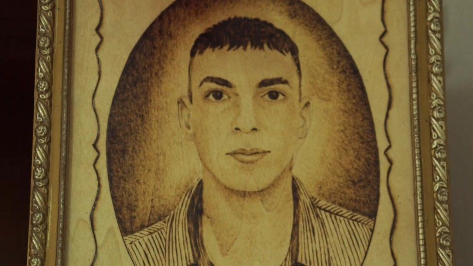 Photo of a painted portrait of Shukri