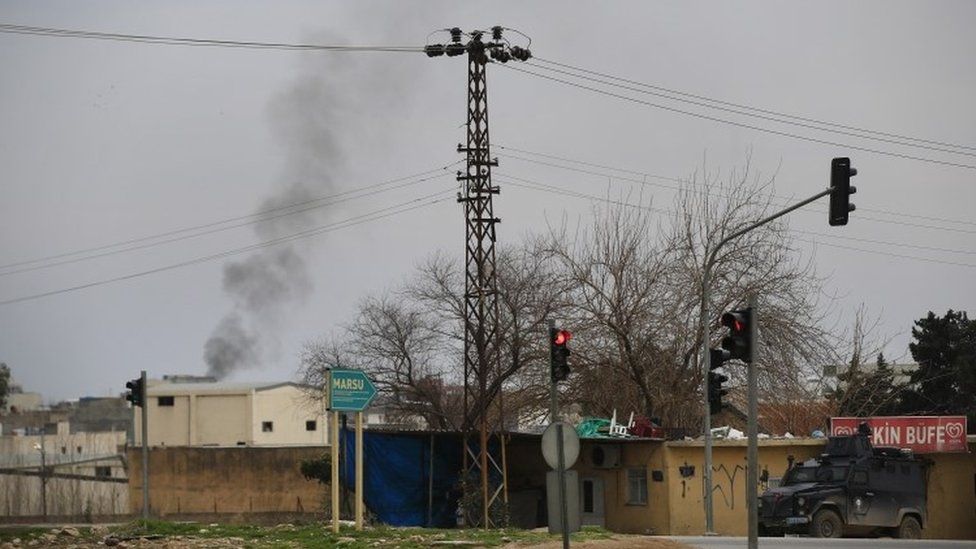 Smoke billows in the south-eastern Turkish town of Nusaybin, Turkey, 14 Feb