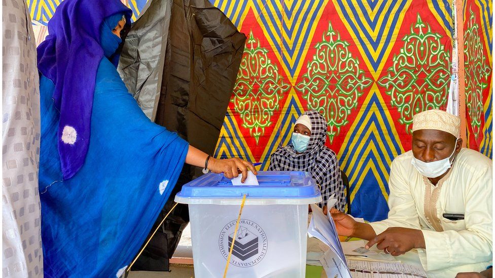 A woman casts her ballot at the pooling station during the presidential election in N'Djamena, Chad April 11, 2021