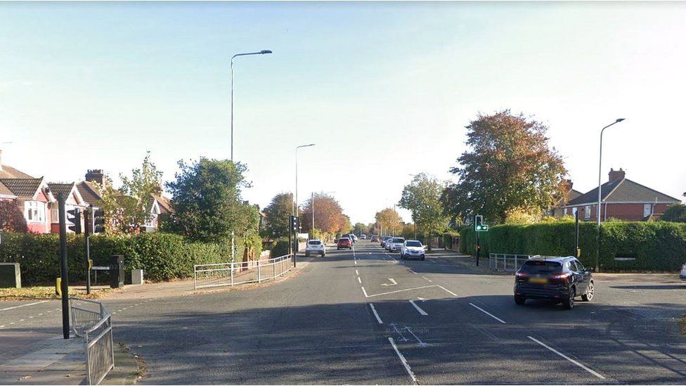 Pedestrian, 74, dies after being hit by lorry on A15 - BBC News