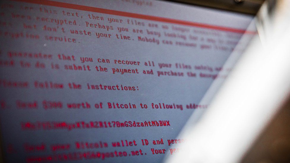 A laptop displays a message after being infected by a ransomware as part of a worldwide cyberattack on June 27, 2017 in Geldrop.