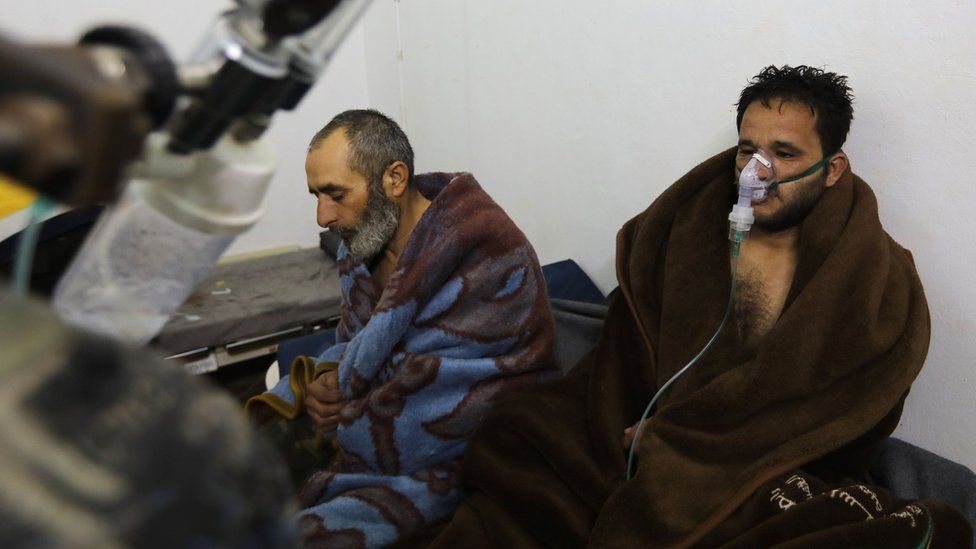 Syrians reportedly suffering from breathing difficulties following a Syrian government air strikes on the town of Saraqeb rest at a field hospital (4 February 2018)