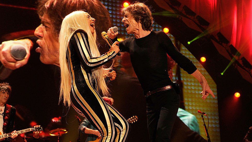 Lady Gaga with Mick Jagger in concert