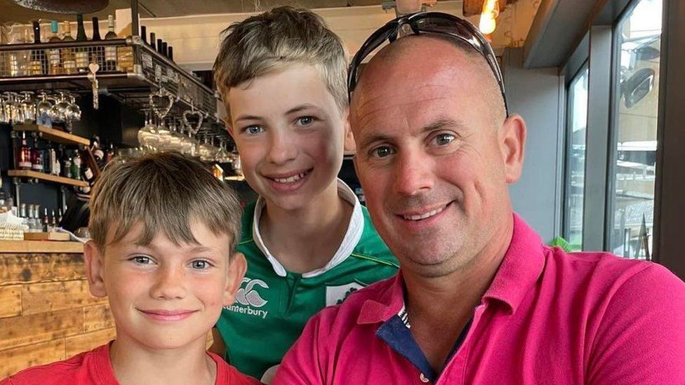 Sean Kennedy pictured with his sons