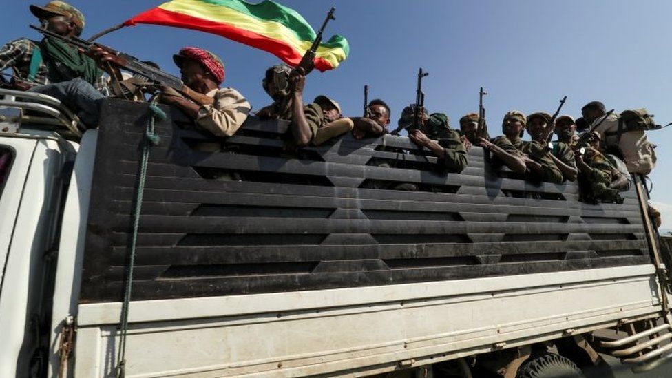 Troops ride in trucks to face soldiers loyal to the Tigray People's Liberation Front