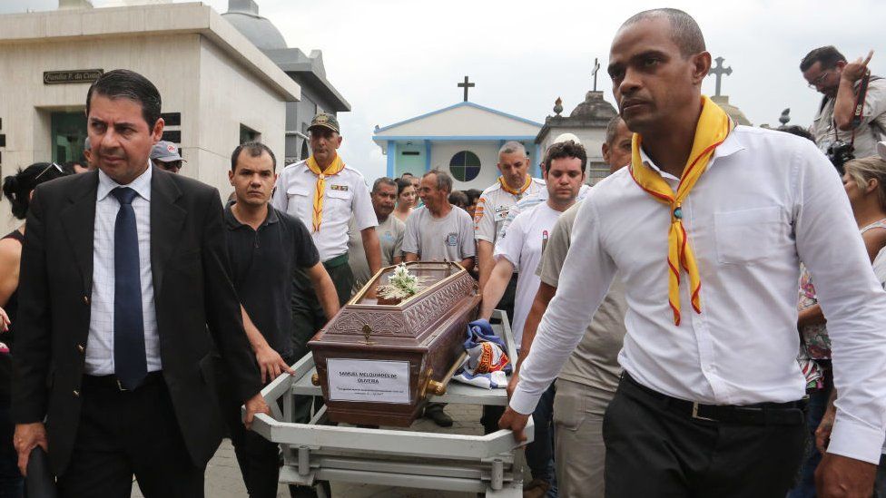 Relatives and friends at the funeral of student Samuel Melquíades Oliveira Silva, 16, at the São Sebastião Cemetery in Suzano, Sao Paulo, on the afternoon of Thursday 14 March, 2019.