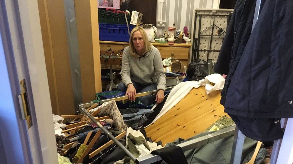 Trish Barkey in ransacked charity shop