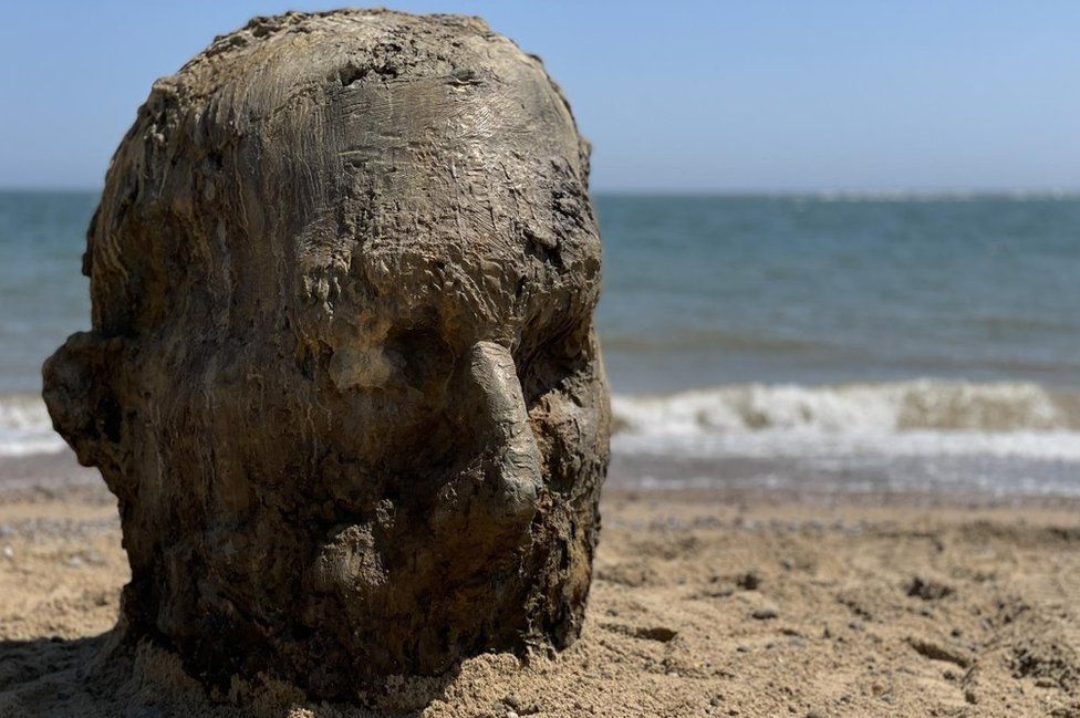 Bronze head sculpture